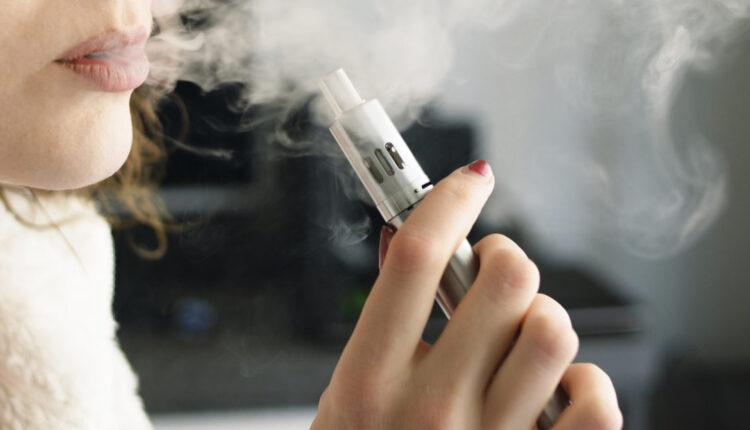 Woman Smoking an E-Cigarette